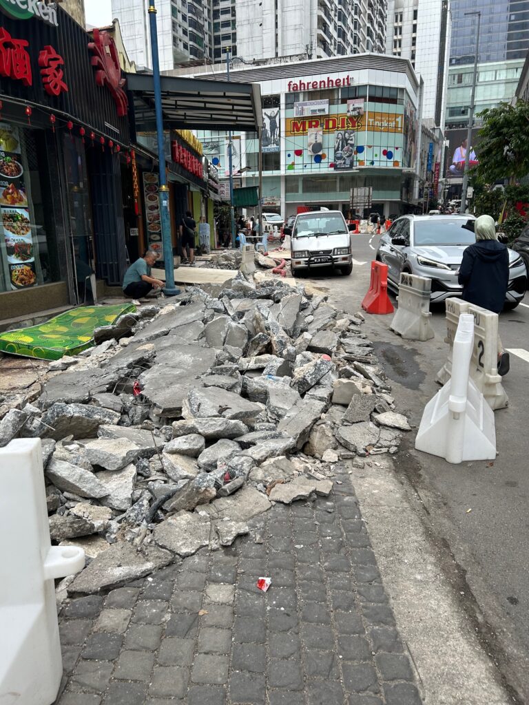 Broken footpath in Kuala Lumpur